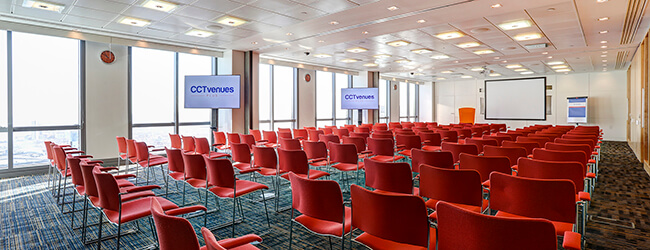red chairs in a big conference room