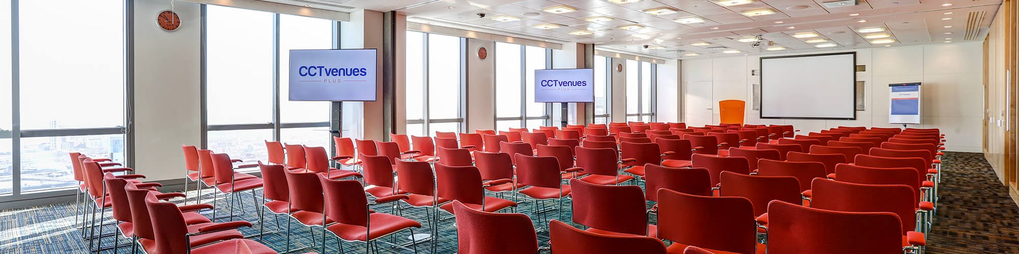 red chairs in a big conference room