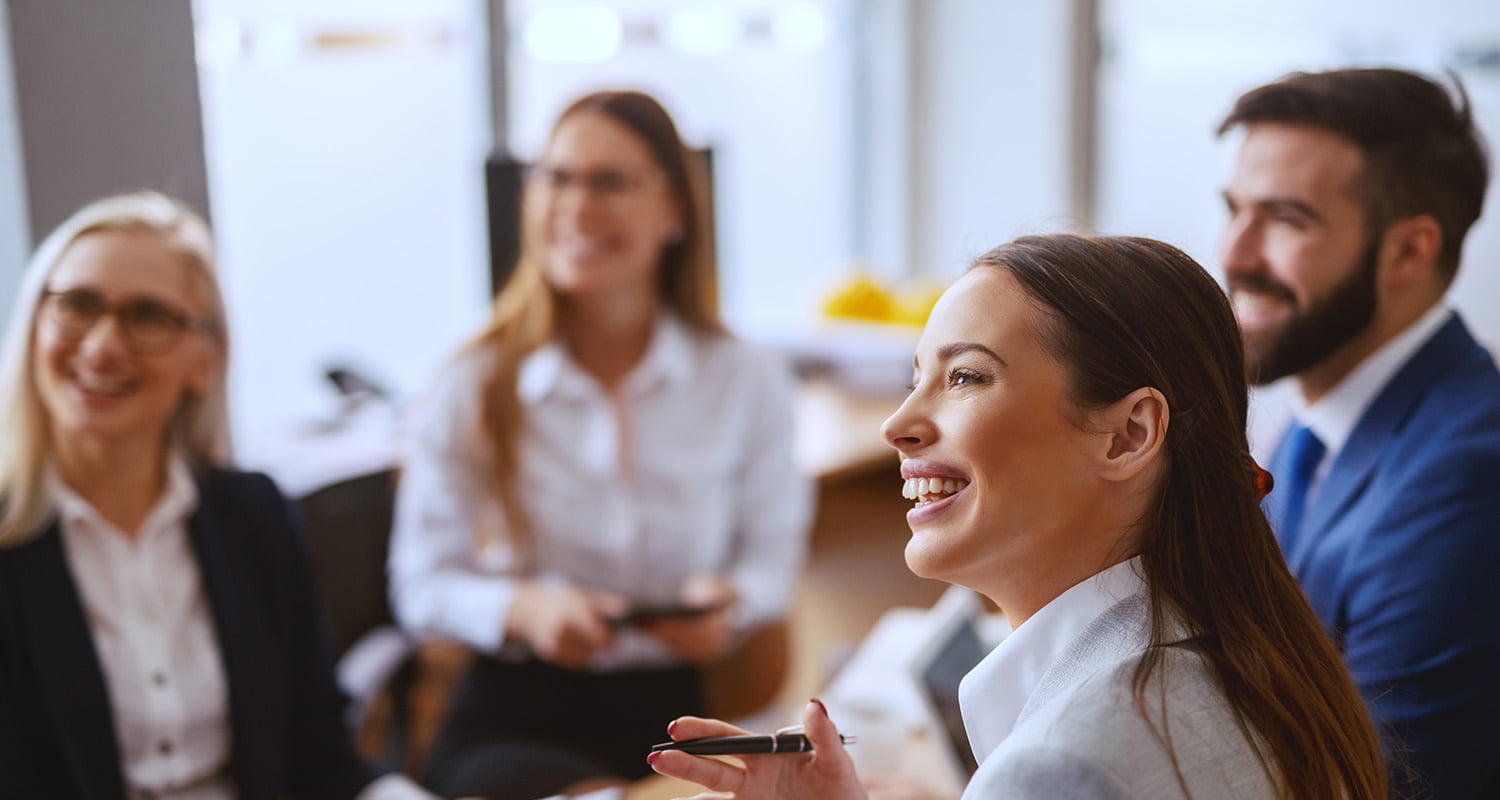 Happy people having a meeting together