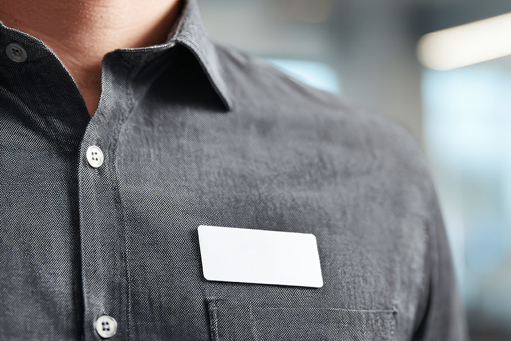 Name badge on shirt.