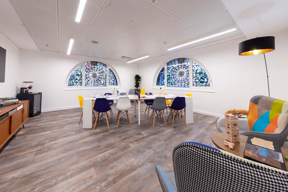 Smithfield venue with glass windows, chairs, jenga.